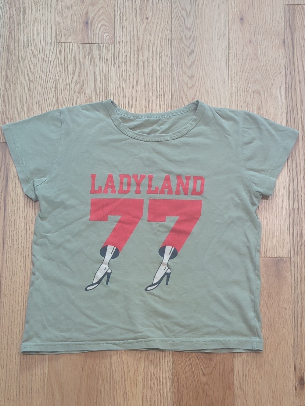 'Ladyland 77' Short Sleeve Crop Tee in Olive Green. Size XS***